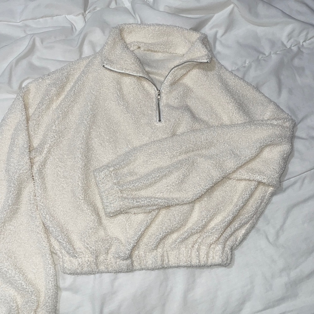 QUARTER ZIP